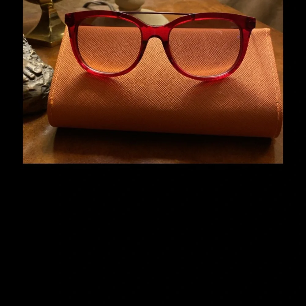 Tory Burch “Cranberry” sunglasses - New with case and dust bag.